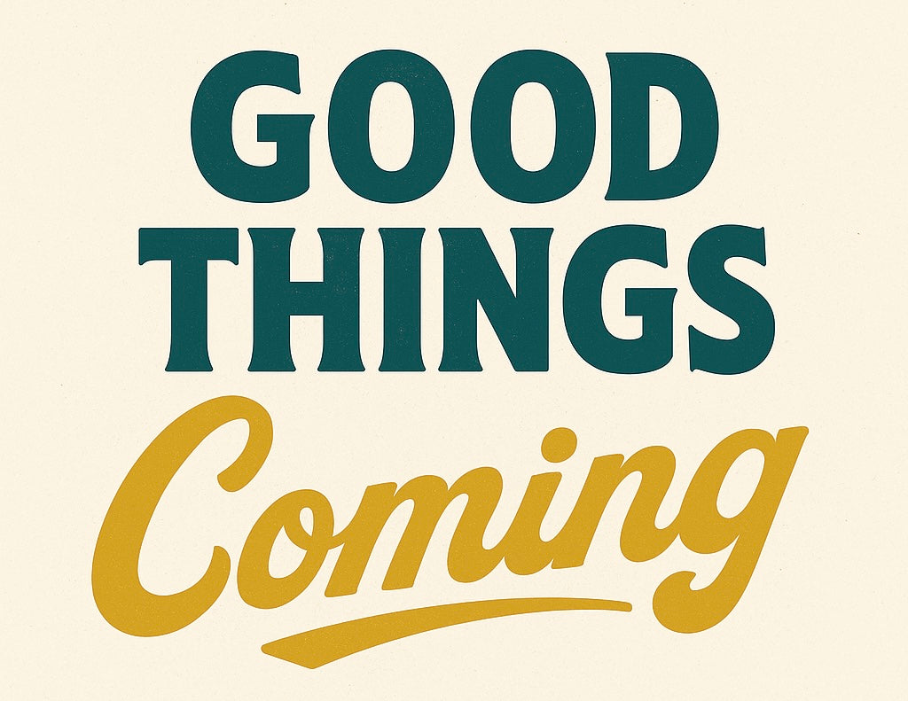 Motivational phrase 'Good Things Coming' in teal and gold on a beige background